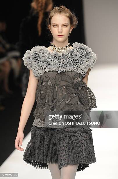 Model displays a creation from the Yuma Koshino 2010/2011 autumn and winter collection, designed by Yuma Koshino in Tokyo on March 24, 2010 as a part...