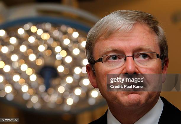 Prime Minister of Australia Kevin Rudd inspects a new operating theatre whilst visiting Princess Margaret Hospital on March 24, 2010 in Perth,...