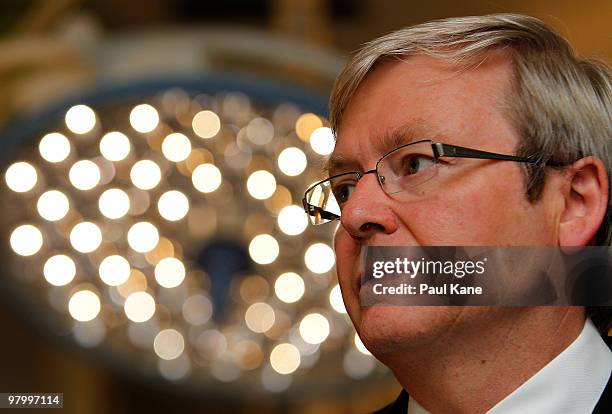 Prime Minister of Australia Kevin Rudd inspects a new operating theatre whilst visiting Princess Margaret Hospital on March 24, 2010 in Perth,...