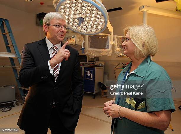 Prime Minister of Australia Kevin Rudd inspects a new operating theatre whilst visiting Princess Margaret Hospital on March 24, 2010 in Perth,...