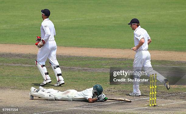 England fielder Paul Collingwood looks on at Bangladesh batsman Shakib Al Hasan after being stumped on 96 runs during day five of the 2nd Test match...