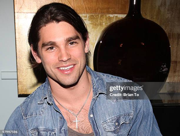 Justin Gaston poses at the "If I Can Dream" house on March 23, 2010 in Los Angeles, California.