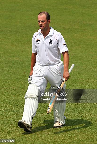 England batsman Jonathan Trott walks off the pitch dejectedly after being dismissed for 19 runs during day five of the 2nd Test match between...