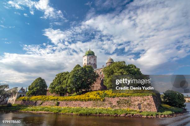 cloudy sky over vyborg castle, vyborg, russia - vyborg-castle stock pictures, royalty-free photos & images