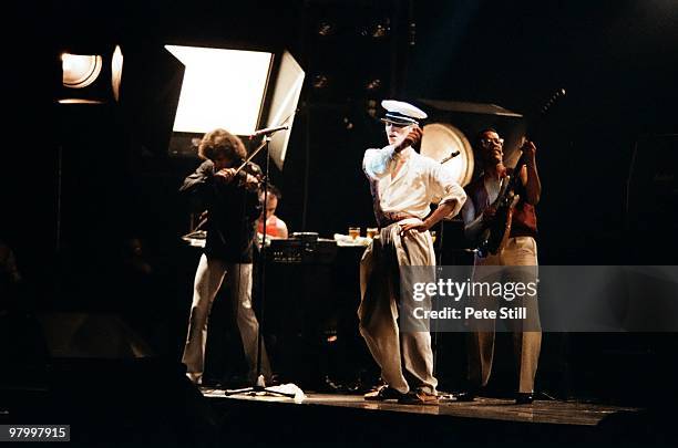 Simon House, David Bowie and Carlos Alomar performs on stage at Earls Court Arena on August 28th, 1978 in London, England.
