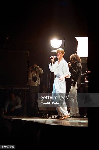 David Bowie and Simon House perform on stage at Earls Court Arena on August 28th, 1978 in London, England.