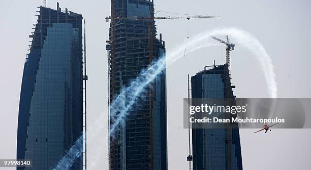 Pete McLeod of Canada in action in front of the Etihad Towers during the Red Bull Air Race 1st training on March 24, 2010 in Abu Dhabi, United Arab...