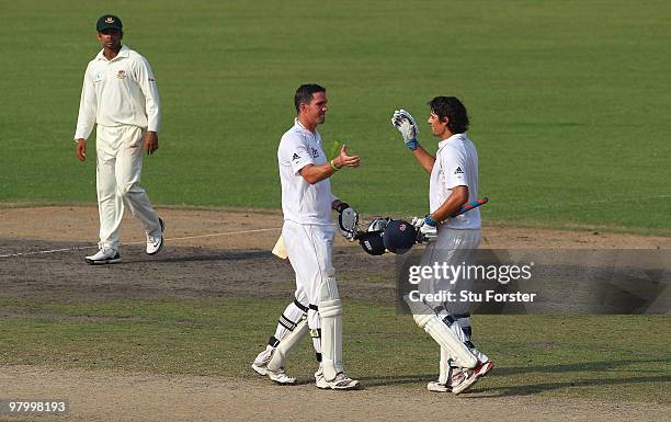 England captain Alastair Cook is congratulated by Kevin Pietersen after scoring the winning runs during day five of the 2nd Test match between...