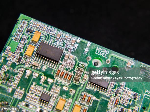 close-up of circuit board - capacitor stock pictures, royalty-free photos & images