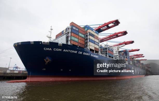 Dpatop - 15 March 2018, Germany, Hamburg: The container ship "Antoine de Saint Exupery" of the CMA CGM shipping company at the container terminal...