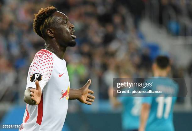 Leipzig's Jean-Kevin Augustin celebrates scoring his sid's 1st goal during the UEFA Europa League round of 16 second leg soccer match between Zenit...