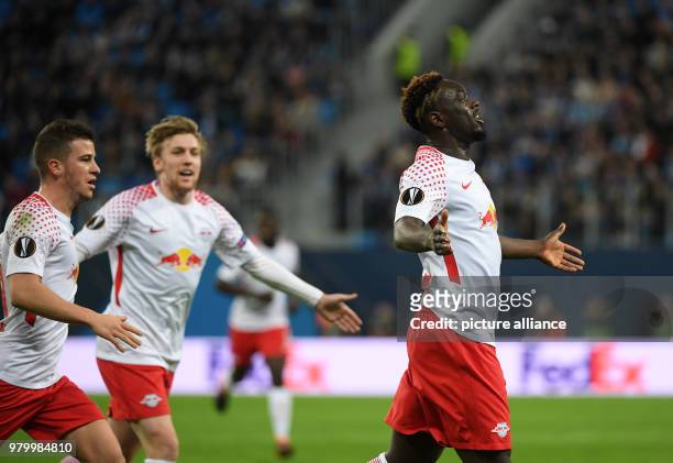 Leipzig's Jean-Kevin Augustin celebrates scoring his sid's 1st goal during the UEFA Europa League round of 16 second leg soccer match between Zenit...