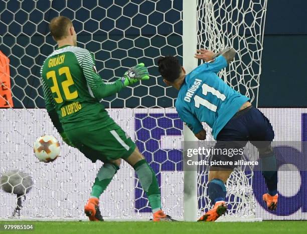 Dpatop - St. Petersburg's Sebastian Driussi scores his sid's 1st goal during the UEFA Europa League round of 16 second leg soccer match between Zenit...