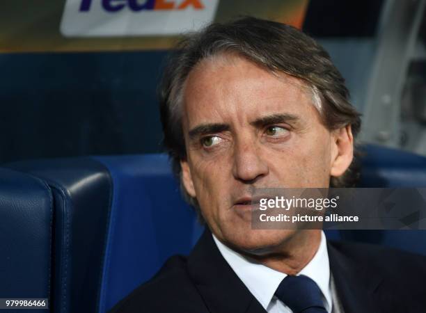 Dpatop - St. Petersburg's head coach Roberto Mancini sits on the bench during the UEFA Europa League round of 16 second leg soccer match between...