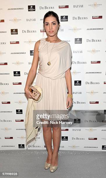 Amber Le Bon attends the Love Ball London hosted by Natalia Vodianova and Harper's Bazaar as part of London Fashion Week Autumn/Winter 2010 in aid of...