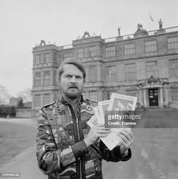 English politician, artist and author Alexander Thynn, 7th Marquess of Bath, holding his manifesto for the General Election, 15th February 1974.