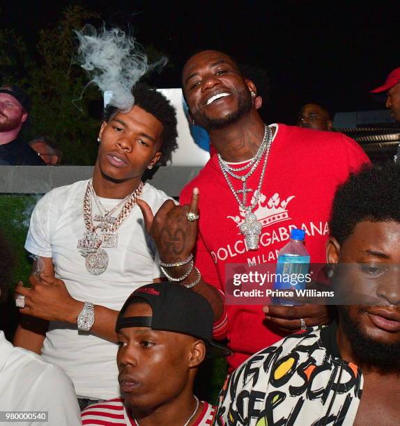 Rapper Lil Baby and Gucci Mane attend Birthday Bash Celebration Hosted by Lil Baby, Trey Songz, and YFN Lucci at Compound on June 17, 2018 in...