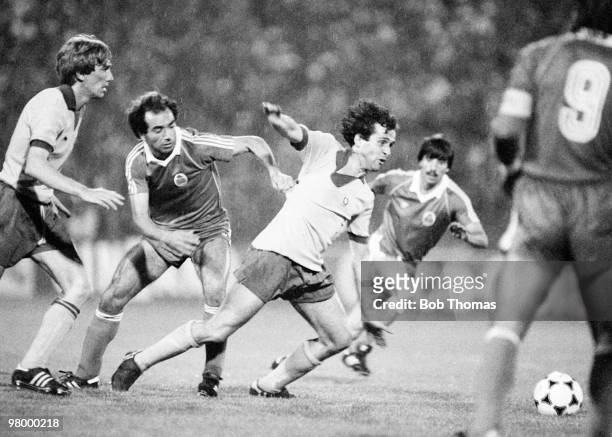 Michel Platini of Juventus is held by Jaime Pacheco of FC Porto during the European Cup Winners Cup Final held at St Jakob-Park in Basle, Switzerland...
