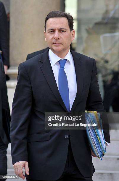 Immigration minister Eric Besson leaves the Elysee palace after attending the weekly cabinet meeting on March 24, 2010 in Paris, France.