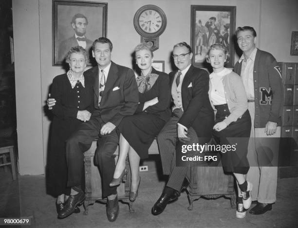 American actress Eve Arden with the cast of the television series 'Our Miss Brooks', circa 1952. From left to right, unknown, Robert Rockwell ,...