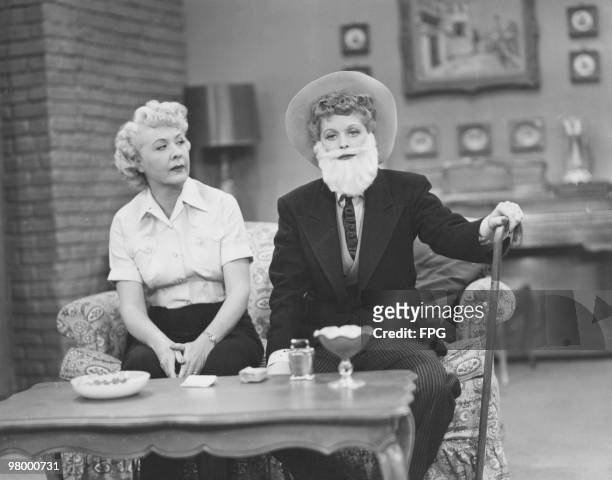 American comedienne Lucille Ball wearing a false beard and a man's suit for 'The Moustache', an episode of the television series 'I Love Lucy', 1952....