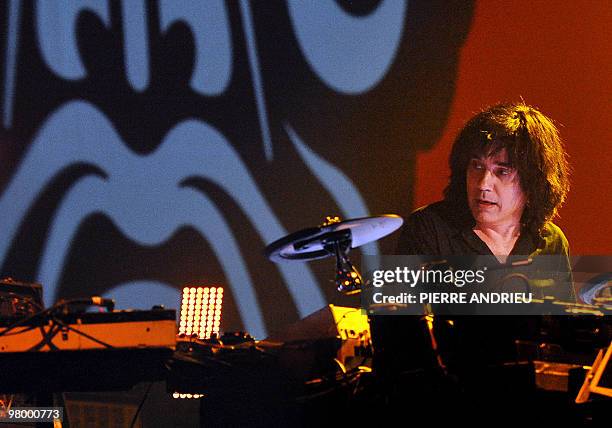 French musician Jean-Michel Jarre performs on stage on march 17, 2010 at the Meriadek skating ring in Bordeaux, western france, as part of his 2010...