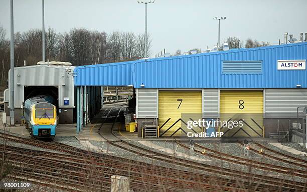 Train stands outside the Alstom maintenance depot in Chester, north-west England, on March 24, 2010. Three members of the board of French engineering...