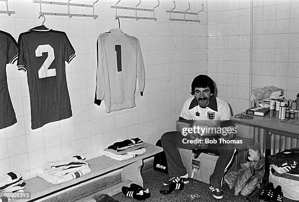 England's assistant physiotherapist Norman Medhurst preparing the boots in the England dressing room prior to the European Championship Qualifying...