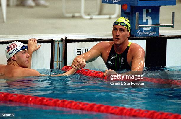 Neil Walker and Chris Fydler of Australia after their swim in the Men's 100m Freestyle heats held at the Sydney International Aquatic Centre during...