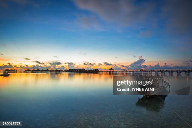 sunrise mabul island - mabul island fotografías e imágenes de stock