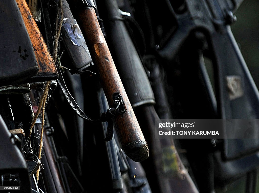 A cache of illegal fire arms drip fuel a