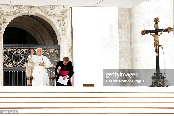 Pope Benedict XVI assisted by his personal secretary Msgr Georg Ganswein attends his weekly audience in St. Peter's Square on March 24, 2010 in...