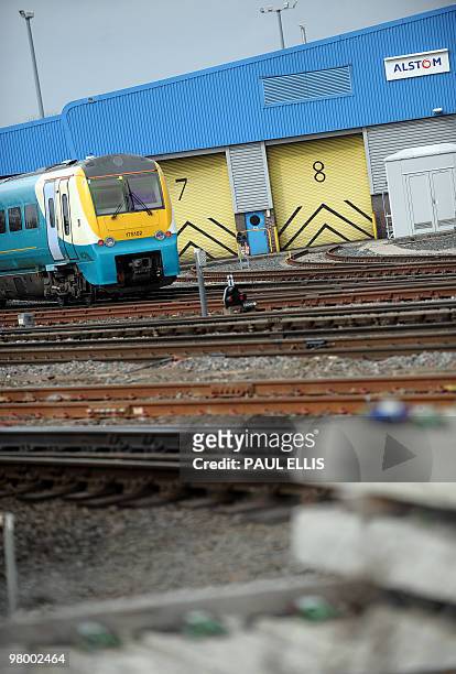 Train stands outside the Alstom maintenance depot in Chester, north-west England, on March 24, 2010. Three members of the board of French engineering...