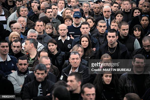 Policemen attend on March 17, 2010 in Dammarie-les-Lys, southeast suburb of Paris, a ceremony to pay tribute to a policeman killed on March 16,...