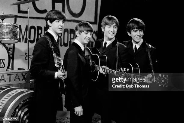 The Beatles during their appearance on the Granada Television Programme, Late Scene Extra, recorded in Manchester, 25th November 1963. Left-right:...
