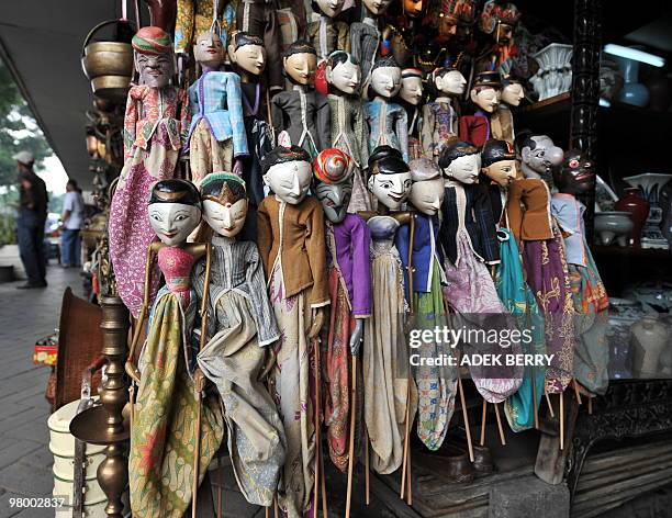 "Wayang golek" or golek puppets are displayed at the Jalan Surabaya antique market in Jakarta on March 23, 2010. The antique market at Jalan Surabaya...