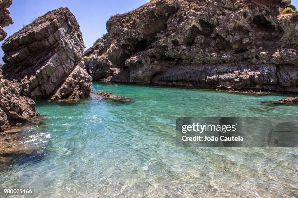 scenic view of rocky coastline, praia, cape verde - cape verde stockfoto's en -beelden