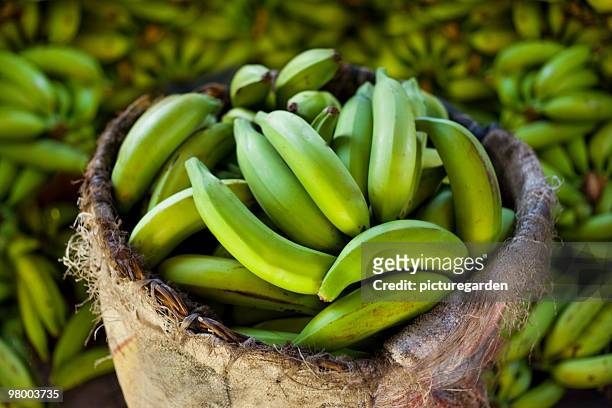bananas in basket - antioquia stock pictures, royalty-free photos & images