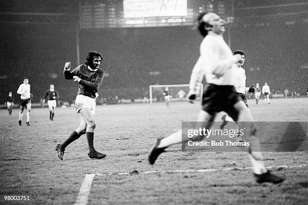 George Best watches his shot as he scores for Northern Ireland during the British Home International Championship match between England and Northern...