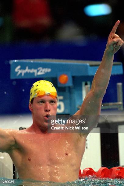 Kieren Perkins of Australia celebrates coming first in the Men's 1500m Freestyle Heats held at the Sydney International Aquatic Centre during the...