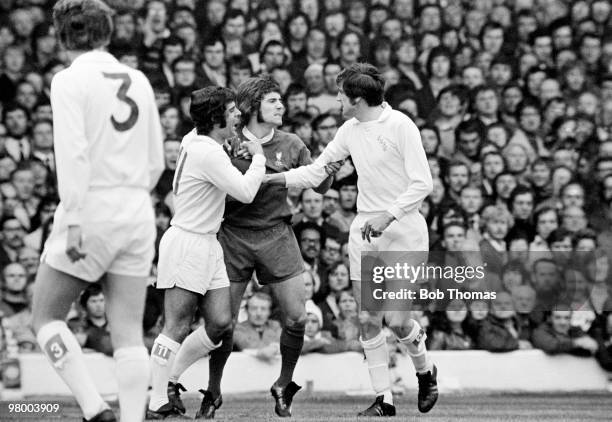 Liverpool striker Kevin Keegan clashes with Leeds United's Norman Hunter and Mick Bates during their First Division league match at Elland Road in...