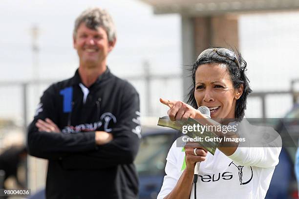 Morne du Plessis and Dame Kelly Holmes attend the Laureus Future Champs Project visit in Khayelitsha on March 24, 2010 in Cape Town, South Africa.