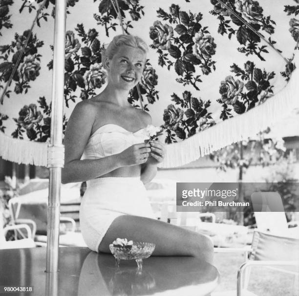 American actress and singer Doris Day at her home in Toluca Lake, Los Angeles, California, circa 1955. "n"n