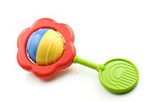 Colorful baby rattle over white background