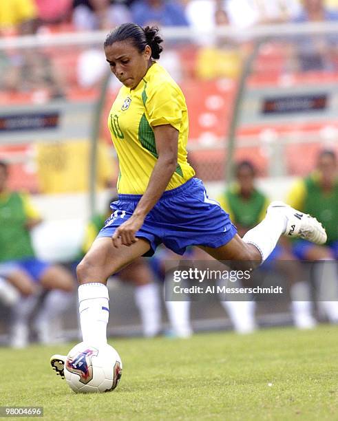 Brazil forward Marta shoots for the goal Saturday, September 27, 2003 at RFK Stadium, Washington, D. C., during the opening round of the FIFA Women's...