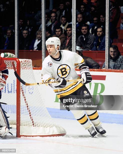 Adam Oates of the Boston Bruins skates against the Montreal Canadiens in the early 1990's at the Montreal Forum in Montreal, Quebec, Canada.