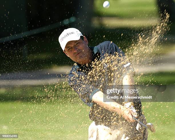 Loren Roberts blasts from the sand Thursday, January 15, 2004 at the Sony Open in Hawaii.