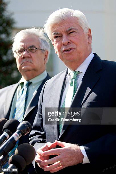 Senator Christopher "Chris" Dodd, a Democrat from Connecticut and Senate Banking Committee Chairman, right, speaks at a news conference with...