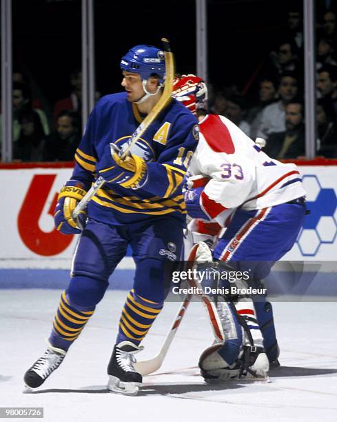 Dale Hawerchuk of the Buffalo Sabres skates against the Montreal Canadiens in the 1990's at the Montreal Forum in Montreal, Quebec, Canada.