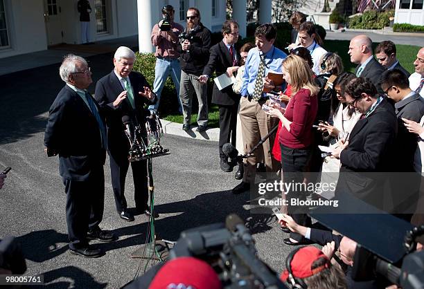 Senator Christopher "Chris" Dodd, a Democrat from Connecticut and Senate Banking Committee Chairman, right, speaks at a news conference with...